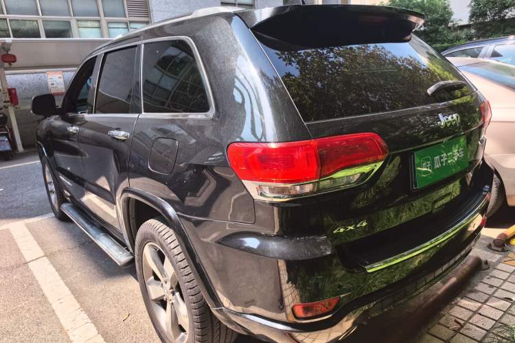 Used Jeep Grand Cherokee 2014 3.6L Elite Navigation Edition Rear Left 45 Deg
