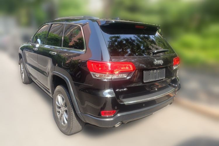Used Jeep Grand Cherokee 2014 3.6L Elite Navigation Edition Rear Left 45 Deg