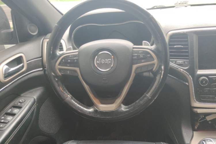 Used Jeep Grand Cherokee 2014 3.6L Elite Navigation Edition Steering Wheel