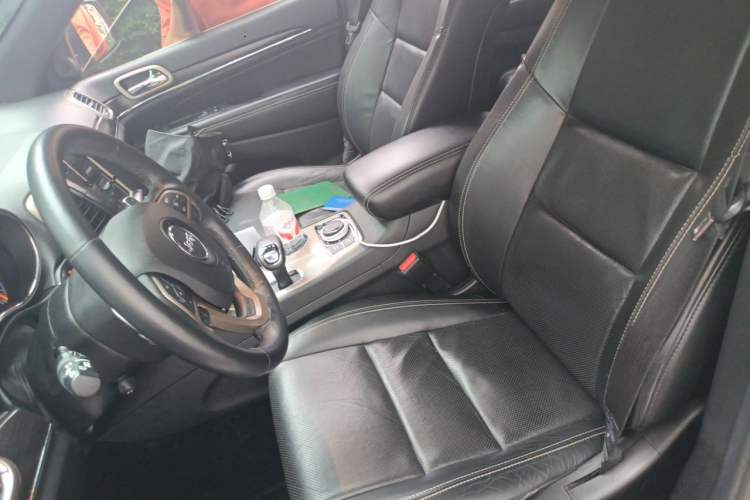 Used Jeep Grand Cherokee 2014 3.6L Elite Navigation Edition Left Front Seat