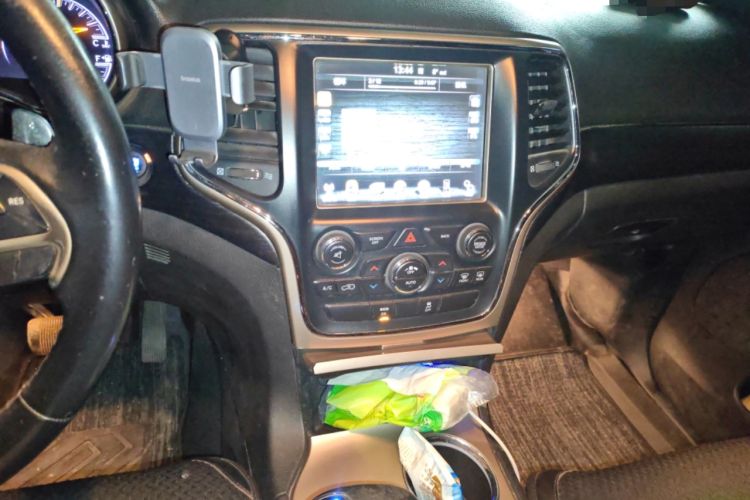 Used Jeep Grand Cherokee 2014 3.6L Comfort Navigation Edition Audio And AC Panel