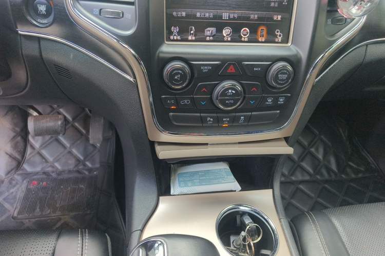 Used Jeep Grand Cherokee 2014 3.6L Elite Navigation Edition Audio And AC Panel