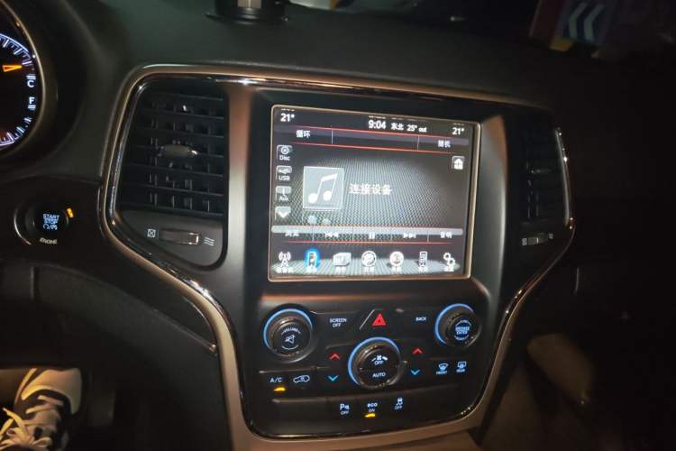 Used Jeep Grand Cherokee 2014 3.6L Elite Navigation Edition Audio And AC Panel