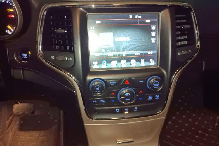 Used Jeep Grand Cherokee 2014 3.6L Elite Navigation Edition Audio And AC Panel