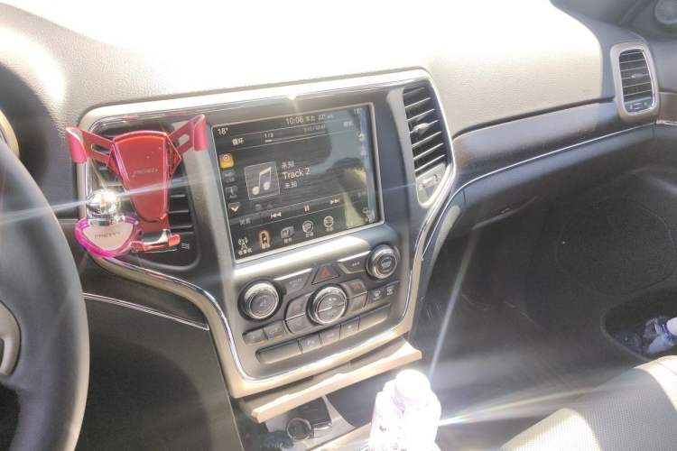 Used Jeep Grand Cherokee 2014 3.6L Elite Navigation Edition Audio And AC Panel