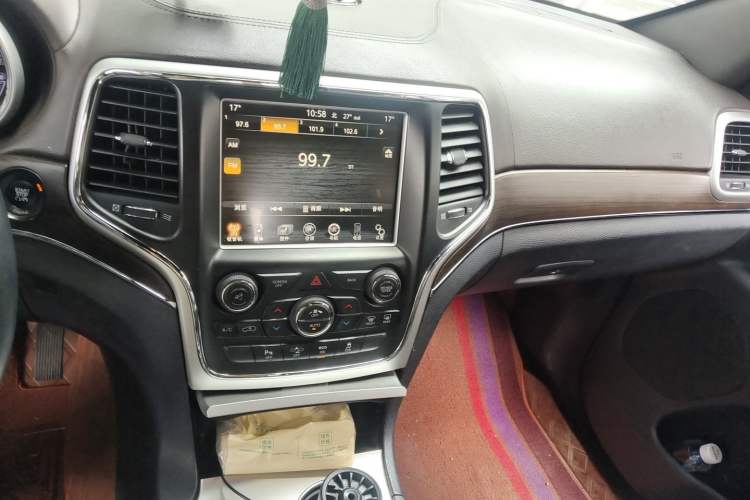Used Jeep Grand Cherokee 2015 3.6L Luxury Navigation Edition Audio And AC Panel