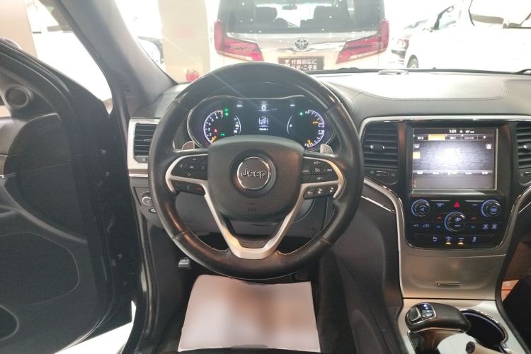 Used Jeep Grand Cherokee 2015 3.6L Luxury Navigation Edition Steering Wheel