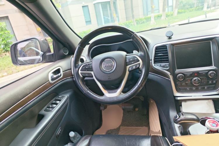 Used Jeep Grand Cherokee 2015 3.6L Luxury Navigation Edition Steering Wheel