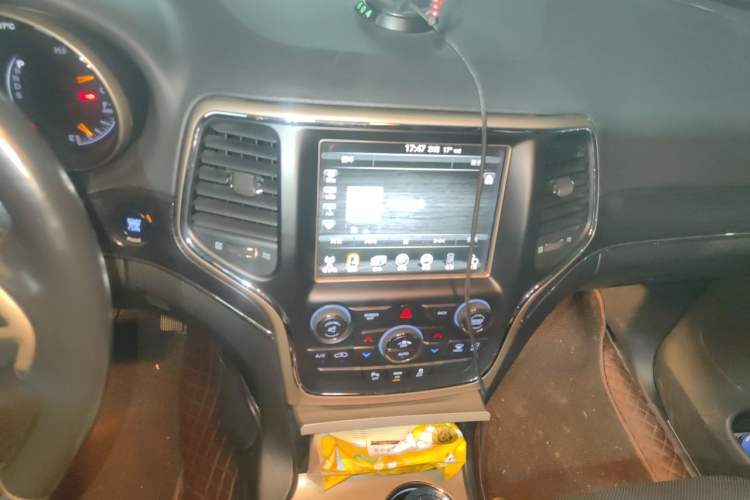 Used Jeep Grand Cherokee 2015 3.6L Elite Navigation Edition Audio And AC Panel
