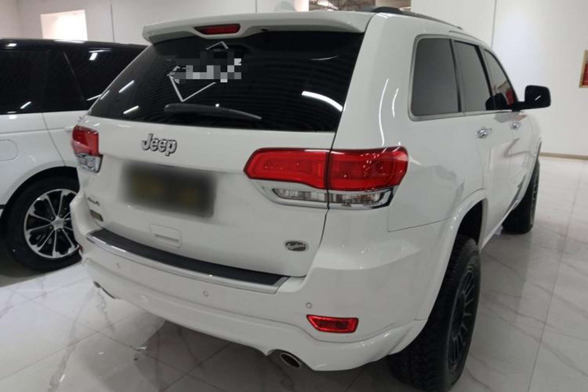 Used Jeep Grand Cherokee 2015 3.6L Luxury Navigation Edition Rear Right 45 Deg