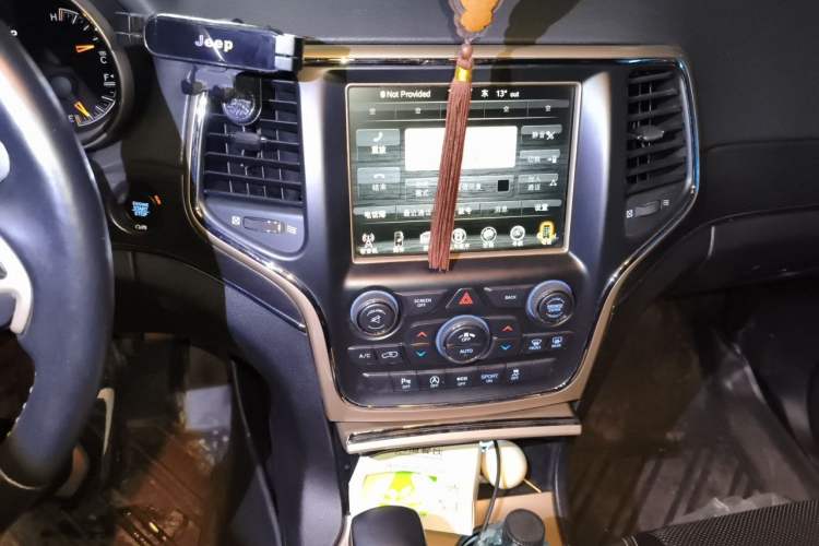 Used Jeep Grand Cherokee 2016 3.0L Elite Navigation Edition Audio And AC Panel