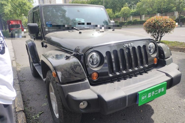 Used Jeep Wrangler 2010 3.8L Sahara two-door model Front Right 45 Deg