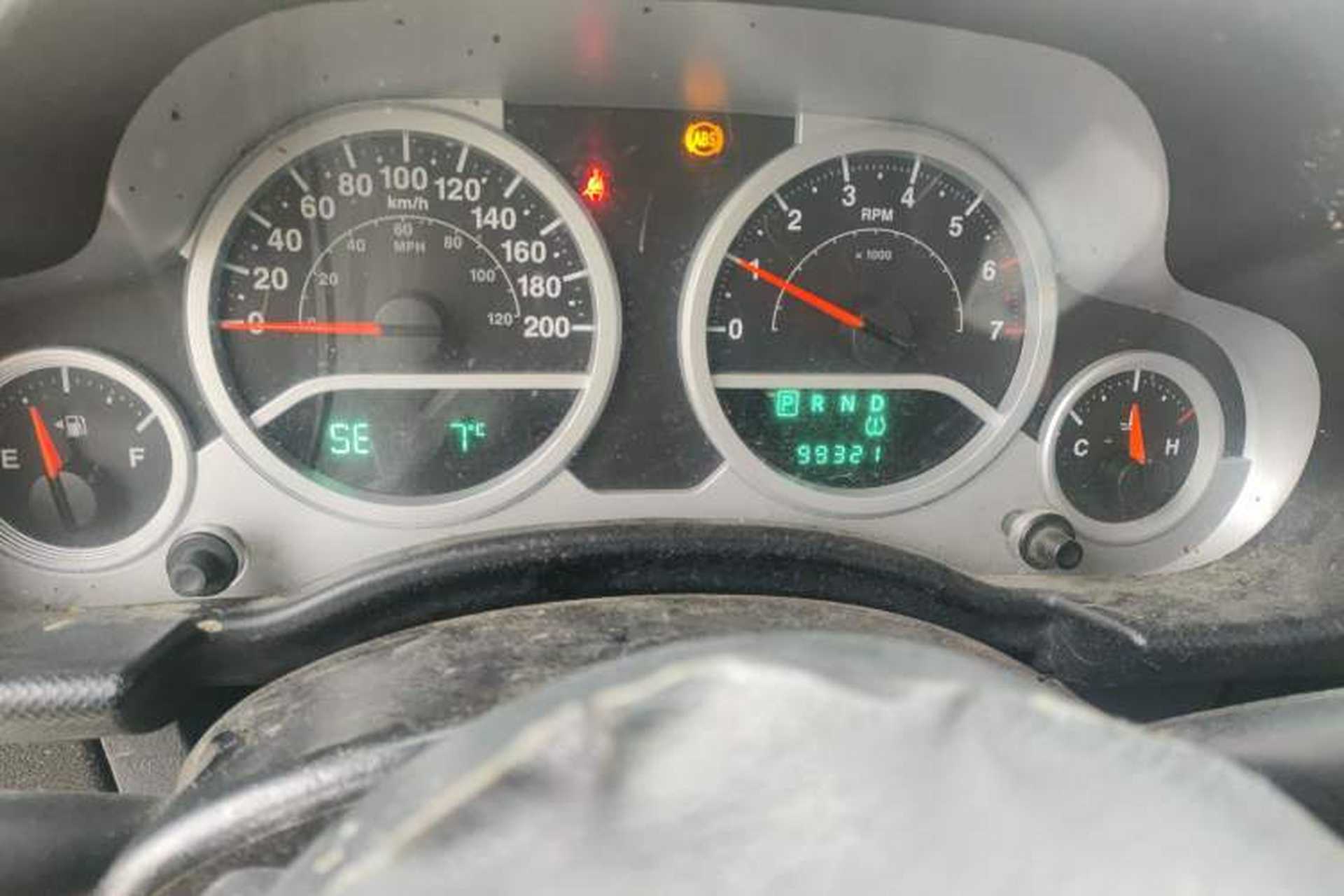 Used Jeep Wrangler 2010 3.8L Sahara two-door model Odometer Close Up