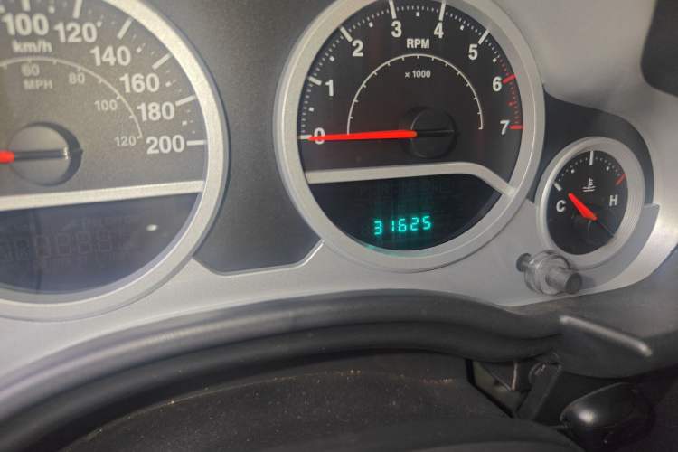 Used Jeep Wrangler 2010 3.8L Sahara Four-Door Edition Odometer Close Up