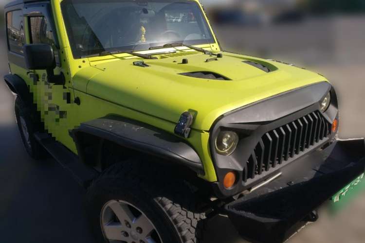 Used Jeep Wrangler 2011 3.8L Sahara two-door model Front Right 45 Deg