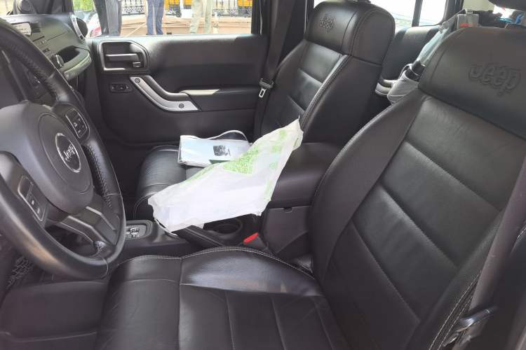 Used Jeep Wrangler 2012 3.6L Sahara Four-Door Edition Left Front Seat