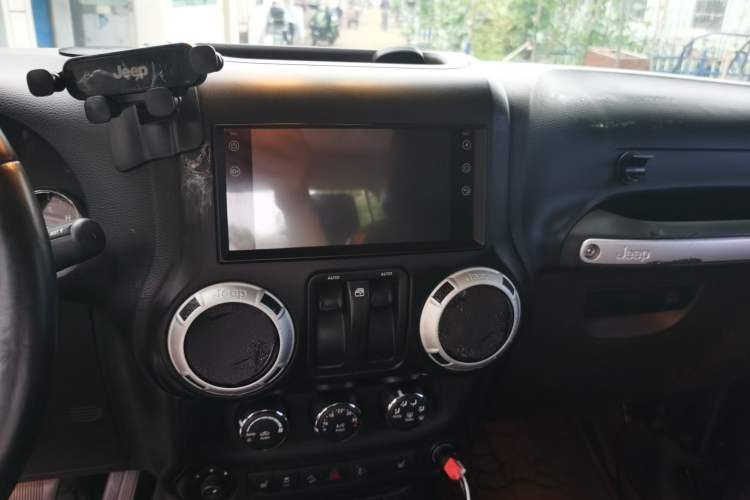 Used Jeep Wrangler 2013 3.6L Sahara two-door model Audio And AC Panel