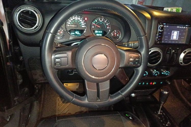 Used Jeep Wrangler 2013 3.6L Sahara two-door model Steering Wheel