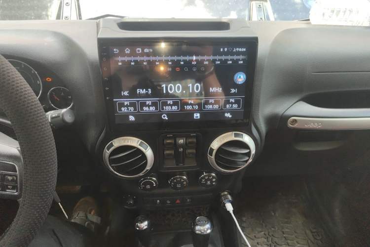 Used Jeep Wrangler 2014 2.8TD Sahara Four-Door Edition Audio And AC Panel