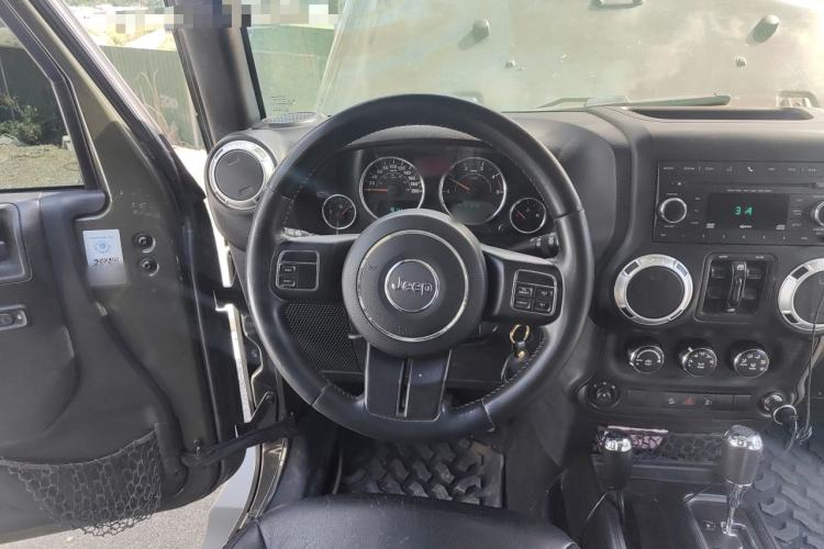 Used Jeep Wrangler 2014 2.8TD Sahara Four-Door Edition Steering Wheel