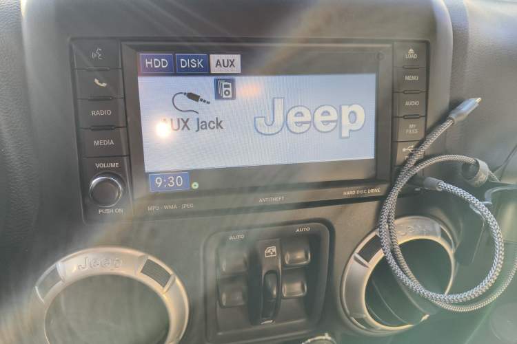 Used Jeep Wrangler 2015 3.0L Sahara Four-Door Comfort Edition Audio And AC Panel