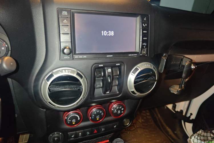 Used Jeep Wrangler 2015 3.0L Four-Door Sahara Comfort Edition Audio And AC Panel
