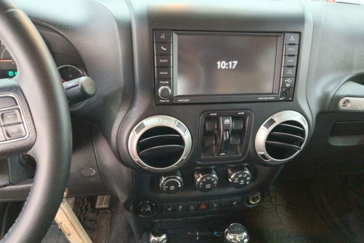 Used Jeep Wrangler 2016 3.0L Sahara 75th Anniversary Edition Audio And AC Panel