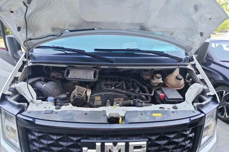 Used JMC Fushun 2023 2.0T Automatic Short-Wheelbase Low-Roof Commercial Van 2/3 Seats with Dual-Opening Tailgate Engine Bay