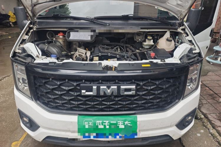Used JMC Fushun 2023 2.0T Manual Diesel Long-Wheelbase High-Roof Business Van with Dual Rear Tires 6–9 Seats Engine Bay