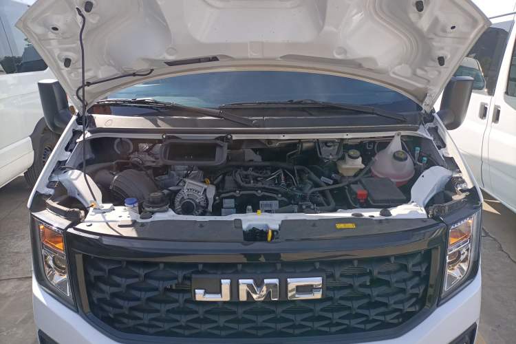 Used JMC Fushun 2023 2.0T Manual Short-Wheelbase Low-Roof Commercial Van 2/3 Seats with Lift-Up Tailgate Engine Bay