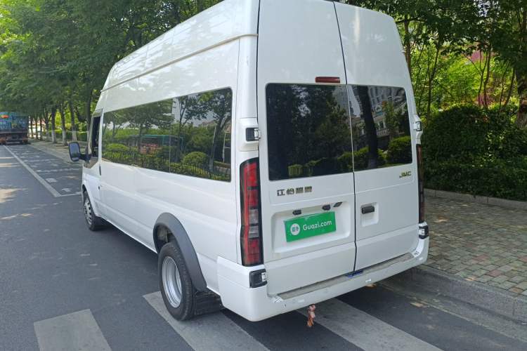 Used JMC Fushun 2023 2.0T Manual Diesel Long-Wheelbase High-Roof Business Van with Dual Rear Tires 6–9 Seats Rear Left 45 Deg