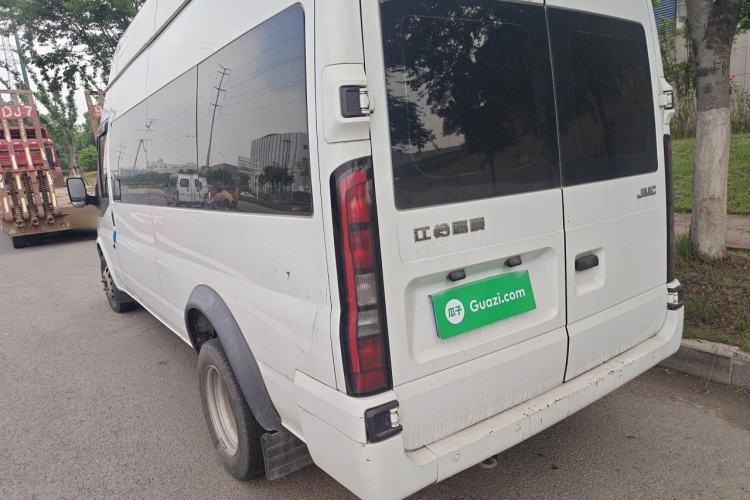 Used JMC Fushun 2023 2.0T Manual Diesel Long-Wheelbase High-Roof Business Van with Dual Rear Tires 6–9 Seats Rear Left 45 Deg