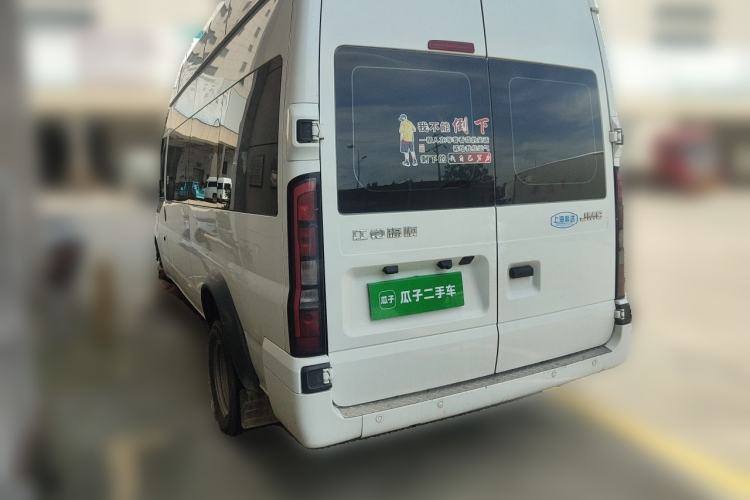 Used JMC Fushun 2023 2.0T Manual Diesel Long-Wheelbase High-Roof Business Van with Dual Rear Tires 6–9 Seats Rear Left 45 Deg