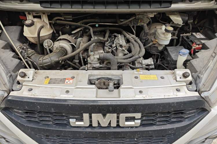Used JMC Transit 2019 2.8T Commercial Version Long Wheelbase Mid-Roof 6-Seater Rear Single Tire China VI Emission Standard – JX493 Engine Bay