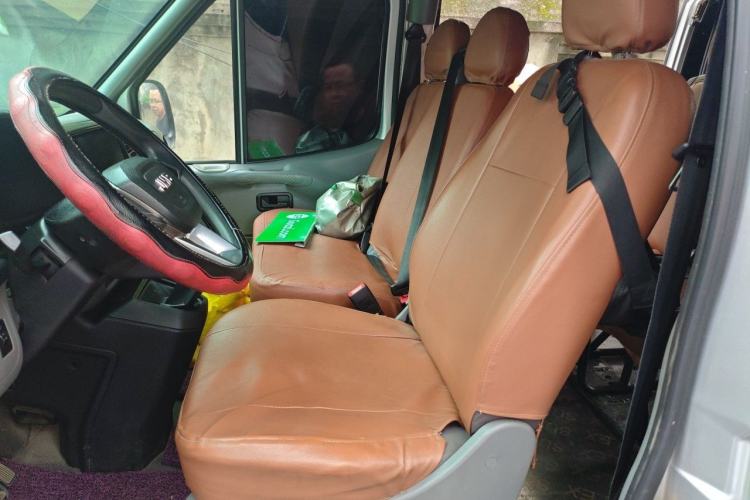 Used JMC Transit 2019 2.8T Commercial Version Long Wheelbase Mid-Roof 6-Seater Rear Single Tire China VI Emission Standard – JX493 Left Front Seat