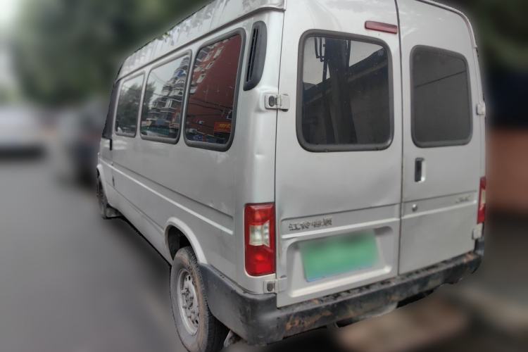 Used JMC Transit 2019 2.8T Commercial Version Long Wheelbase Mid-Roof 6-Seater Rear Single Tire China VI Emission Standard – JX493 Rear Left 45 Deg