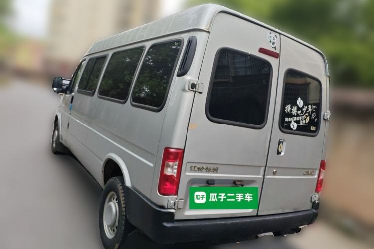 Used JMC Transit 2019 2.8T Commercial Version Long Wheelbase Mid-Roof 6-Seater Rear Single Tire China VI Emission Standard – JX493 Rear Left 45 Deg