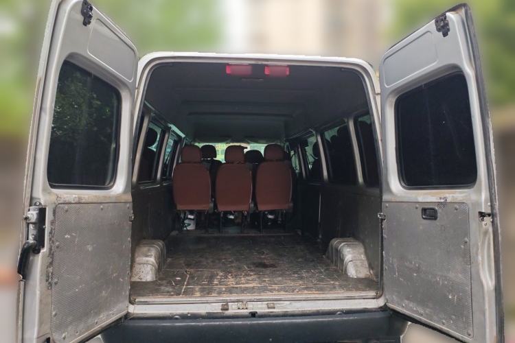 Used JMC Transit 2019 2.8T Commercial Version Long Wheelbase Mid-Roof 6-Seater Rear Single Tire China VI Emission Standard – JX493 Trunk