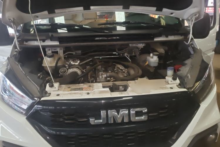Used JMC Transit 2019 2.8T Commercial Version Long Wheelbase Mid-Roof 3-Seater Rear Single Tire China VI Emission Standard – JX493 Engine Bay