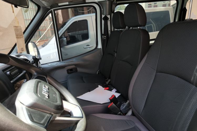 Used JMC Transit 2019 2.8T Commercial Version Intelligent Automatic Transmission Short Wheelbase Mid-Roof Design 6 Seats China VI Emission Standard – JX493 Left Front Seat