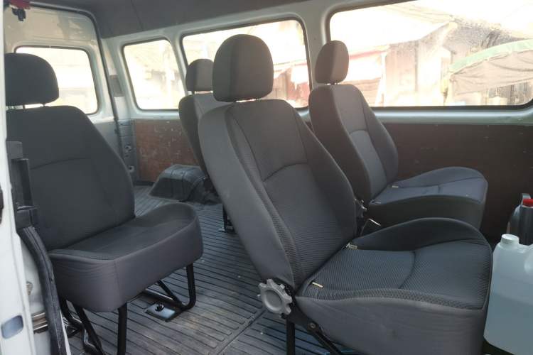 Used JMC Transit 2019 2.8T Commercial Version Long Wheelbase Mid-Roof 6-Seater Rear Single Tire China VI Emission Standard – JX493 Left Rear Seat