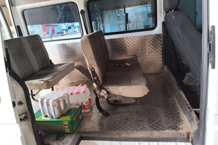 Used JMC Transit 2019 2.8T Commercial Version Short Wheelbase Mid-Roof 7-Seater China VI Standard JX493 Left Rear Seat