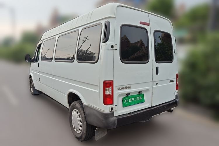 Used JMC Transit 2019 2.8T Commercial Version Long Wheelbase Mid-Roof 6-Seater Rear Single Tire China VI Emission Standard – JX493 Rear Left 45 Deg