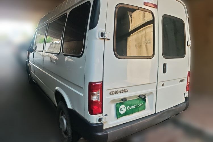 Used JMC Transit 2019 2.8T Commercial Version Long Wheelbase Mid-Roof 6-Seater Rear Single Tire China VI Emission Standard – JX493 Rear Left 45 Deg