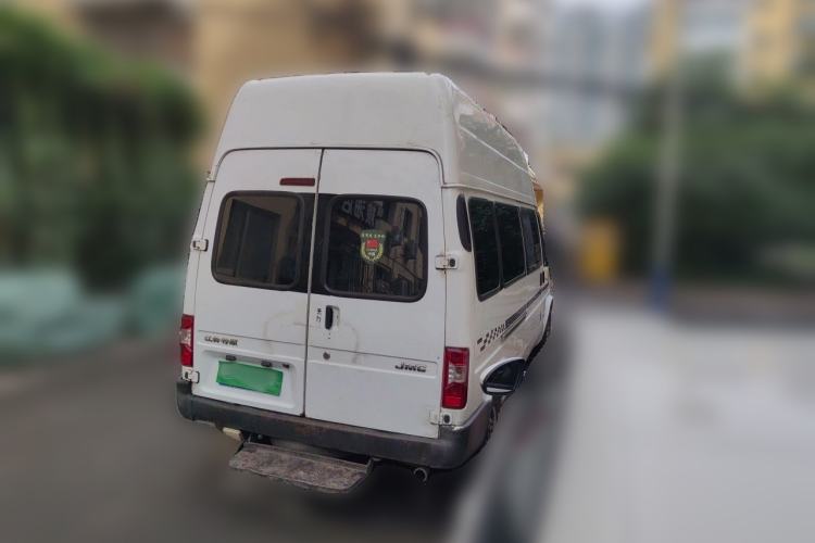 Used JMC Transit 2019 2.8T Commercial Version Long Wheelbase High Roof 6-Seater Rear Single Tire China VI Emission Standard – JX493 Rear Right 45 Deg