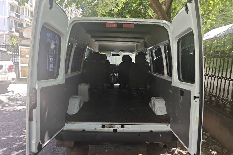 Used JMC Transit 2019 2.8T Commercial Version Long Wheelbase Mid-Roof 6-Seater Rear Single Tire China VI Emission Standard – JX493 Trunk
