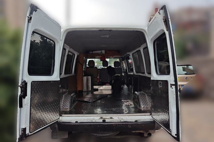 Used JMC Transit 2019 2.8T Commercial Version Long Wheelbase Mid-Roof 6-Seater Rear Single Tire China VI Emission Standard – JX493 Trunk