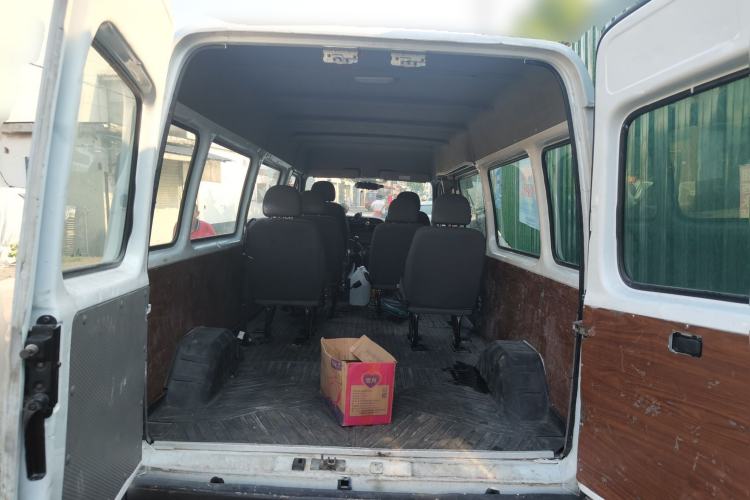 Used JMC Transit 2019 2.8T Commercial Version Long Wheelbase Mid-Roof 6-Seater Rear Single Tire China VI Emission Standard – JX493 Trunk