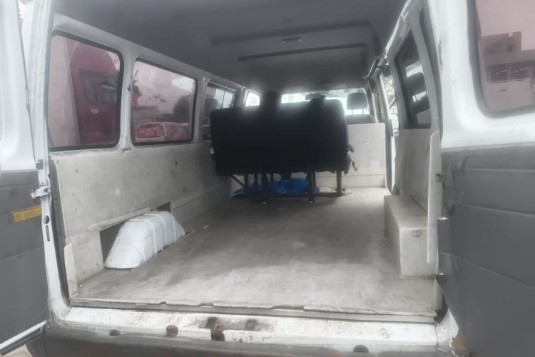 Used JMC Transit 2019 2.8T Commercial Version Long Wheelbase Mid-Roof 6-Seater Rear Single Tire China VI Emission Standard – JX493 Trunk