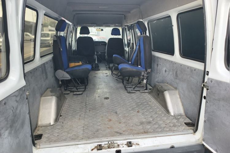 Used JMC Transit 2019 2.8T Commercial Version Long Wheelbase Mid-Roof 6-Seater Rear Single Tire China VI Emission Standard – JX493 Trunk